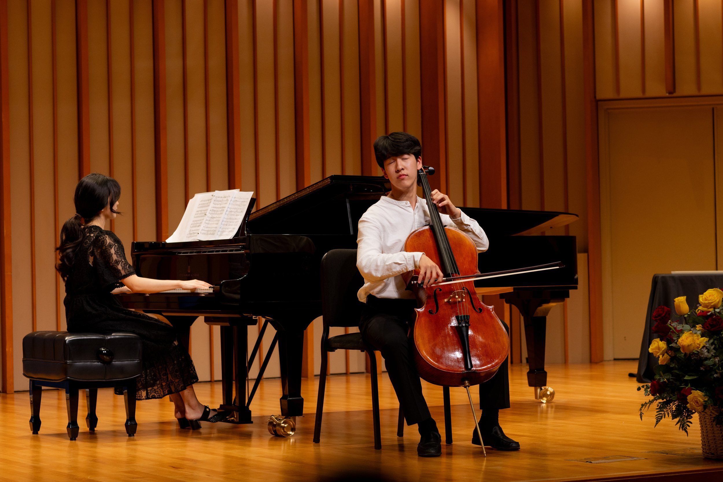 Celloist playing with a pianist on Zipper Hall Concert Hall Stage